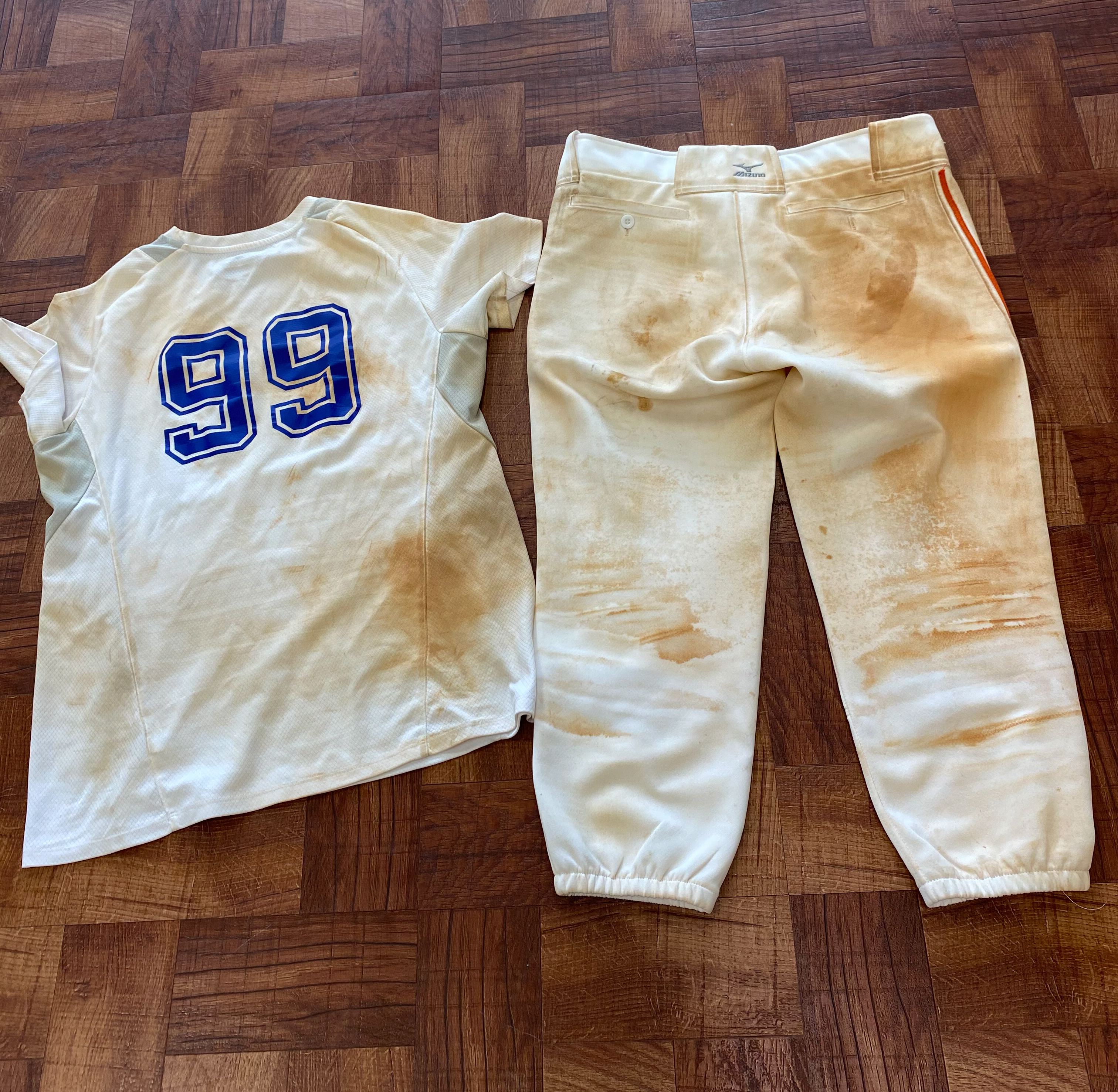 Baseball uniform before professional dry cleaning